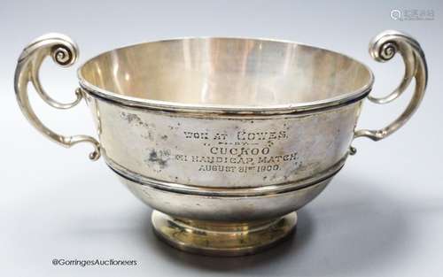 A late Victorian silver two handled presentation bowl, with ...