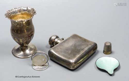 A George V silver hip flask, width 85mm, a small silver vase...