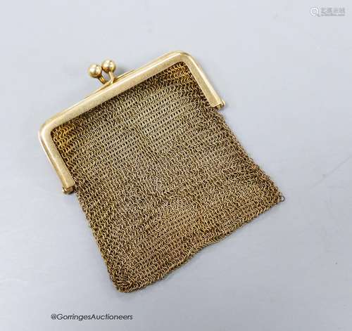 A small yellow metal (stamped 9ct) mesh evening purse, gross...