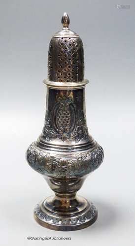 A late Victorian repousse silver sugar caster, marks rubbed,...