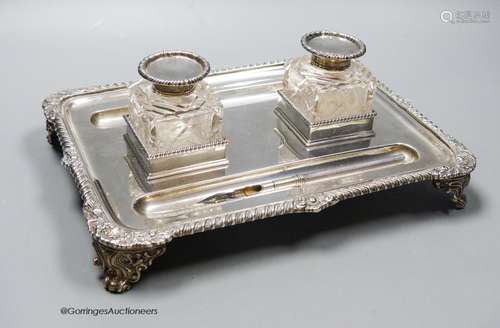 A late Victorian silver rectangular inkstand, with two mount...