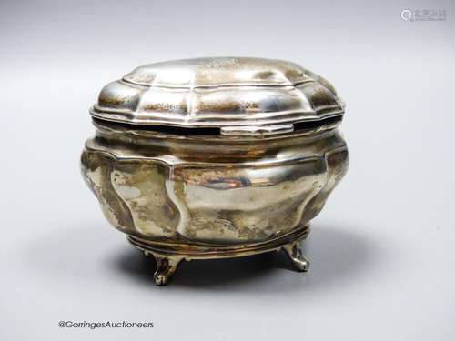 An Edwardian silver shaped oval tea caddy, Charles Stuart Ha...