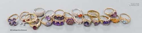 Twenty assorted modern 9ct or 9k and gem set dress rings, gr...