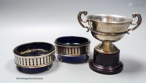 A pair of George V pieced silver small circular dishes with ...