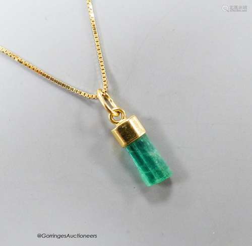 A modern Italian 750 yellow metal and emerald set pendant, 1...