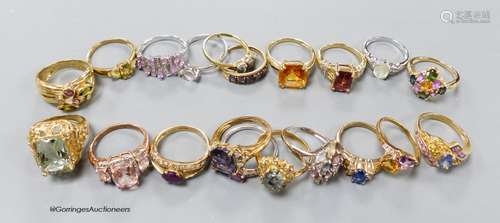 Twenty assorted modern 9ct or 9k and gem set dress rings, gr...