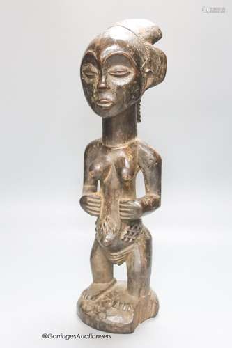 An African Luba tribal wood maternity figure, height 45cm