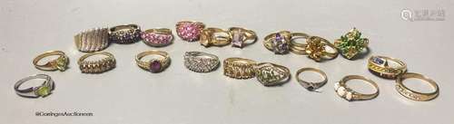 Twenty assorted modern 9ct or 9k and gem set dress rings, gr...