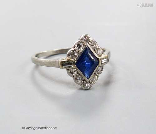 A 1920's white metal (stamped platinum), sapphire, baguette ...