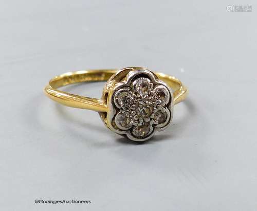 A 1920's 18ct & plat set circular diamond cluster ring, size...