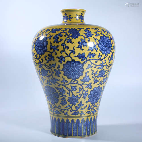 Plum vase with lotus pattern on yellow background and blue a...