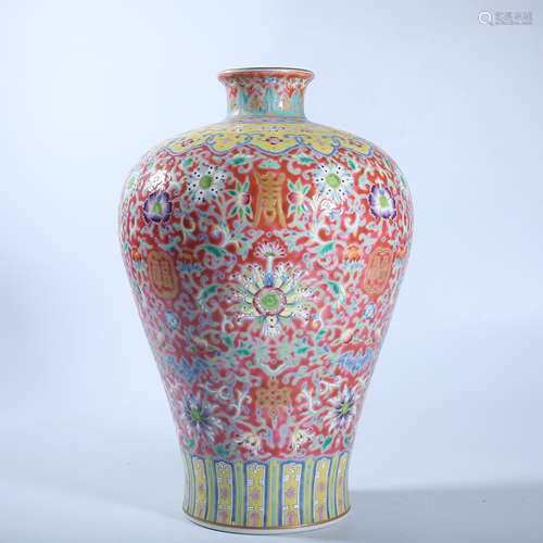 A plum vase with lotus patterns and pink twigs in the Qing D...