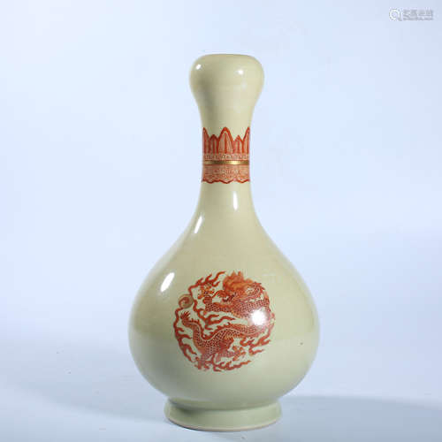 Garlic bottle with red dragon pattern on yellow background i...