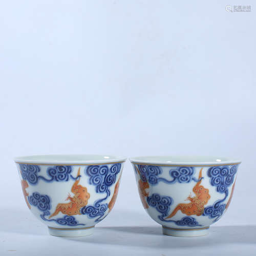 A pair of blue, white and red cups in the Qing Dynasty