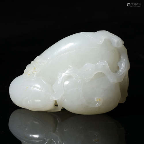 A White Jade Carved Melon Shaped Pendant