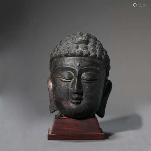 A Bronze Buddha Head Ornament