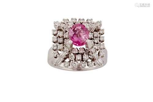 A pink sapphire and diamond dress ring