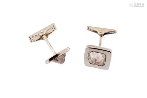 De Beers | A pair of white gold and diamond 'Talisman' cuffl...