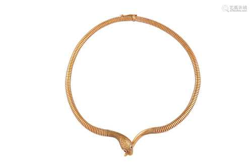 A gold snake necklace, 1958-59