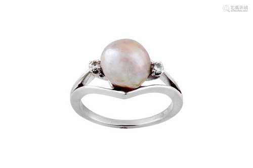 A cultured pearl and diamond ring