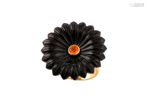 An onyx flower ring