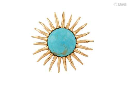 A turquoise sunburst pendant
