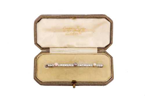 A pearl, conch pearl and diamond bar brooch, circa 1920