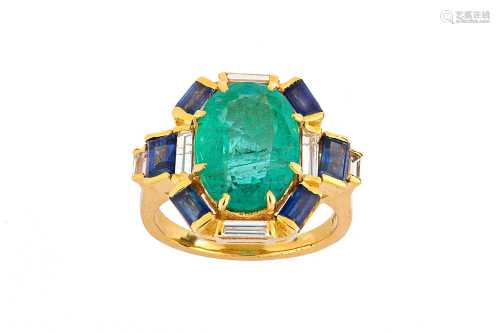An emerald, sapphire and diamond dress ring