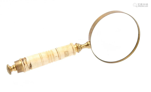 Old magnifying glass with bone grip