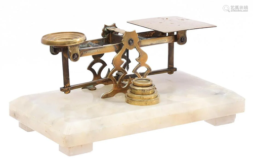 Antique balance with 4 weights