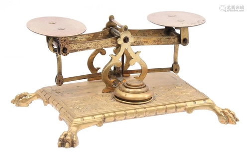 Antique balance with 4 weights