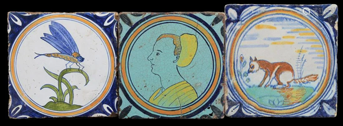 4 glazed earthenware circle tiles