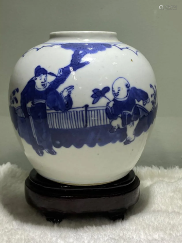 A SMALL BLUE AND WHITE 'KIDS-PLAYING' JAR