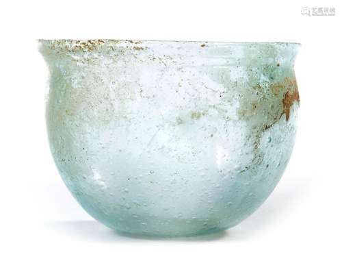 A LIGHT BLUE GLASS RHENISH BOWL, 600-700 AD