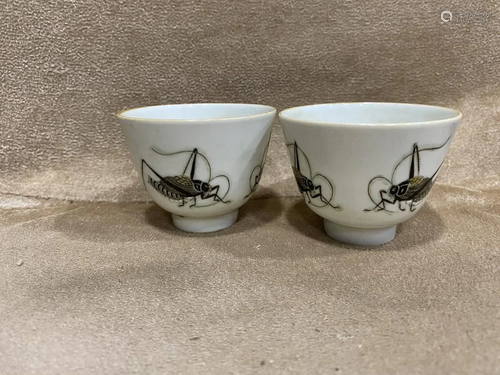 PAIR OF INK GLAZED 'LOCUST' CUPS