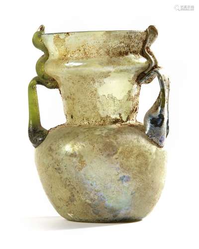 A ROMAN DOUBLE HANDLED GLASS BOTTLE, 2ND-3RD CENTURY AD