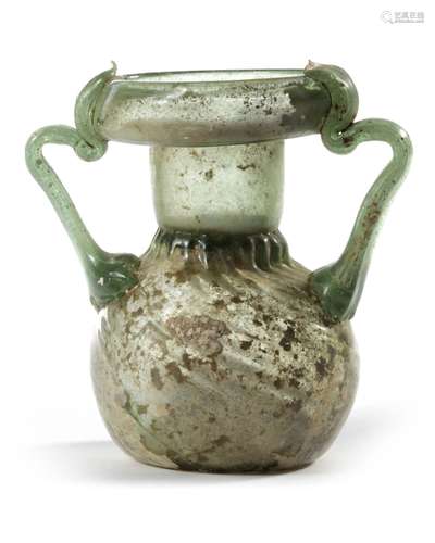 A ROMAN GLASS BOTTLE, DOUBLE HANDLED, 2ND-3RD CENTURY AD