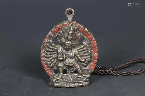 A TIBETAN BRONZE AMULET