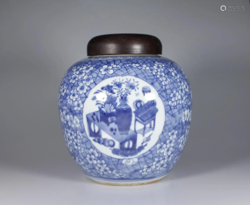 BLUE AND WHITE OPEN FACE FLORAL JAR WITH LID