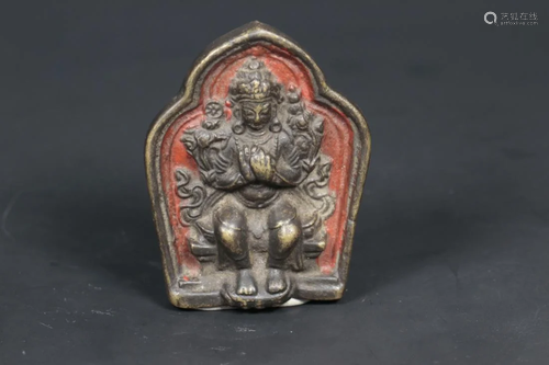 A TIBETAN BRONZE AMULET