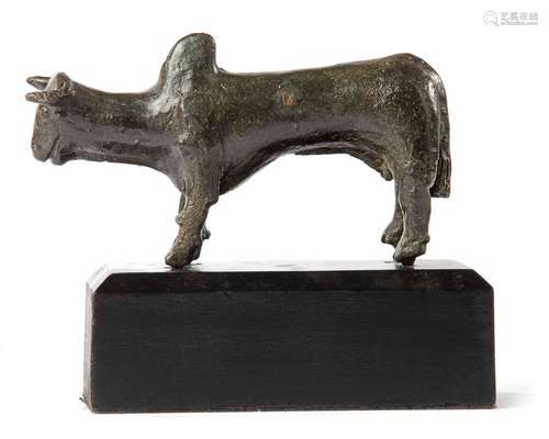 A BRONZE FIGURE OF A HUMPED BACTRIAN BULL, 2ND MILLENIUM BC