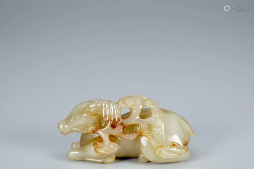 OPENWORK RUSSET JADE CARVING OF CROUCHING DEER