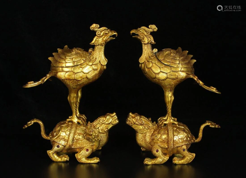 PAIR OF GILT BRONZE PIECES OF PHOENIX ON BEAST