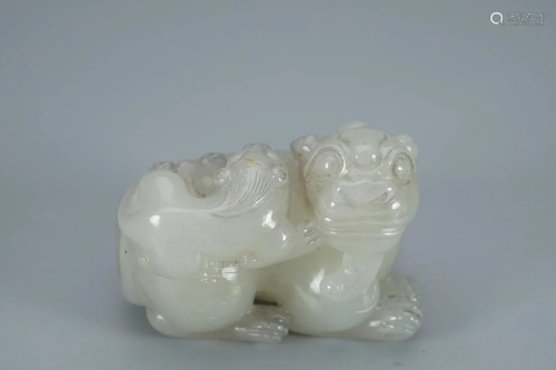 CHINESE RUSSET JADE CARVING OF BEAST AND CUB