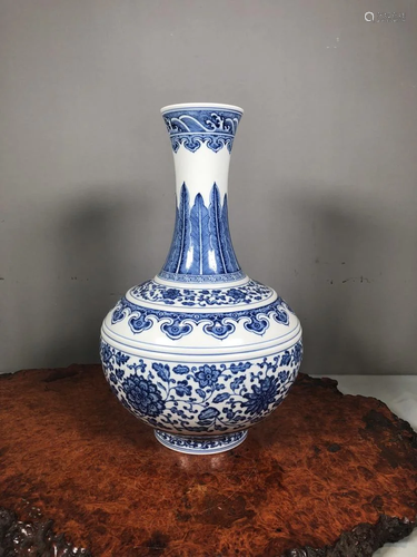 BLUE AND WHITE FLORAL VASE WITH BOW STRING