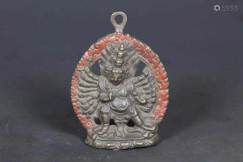 A TIBETAN BRONZE AMULET