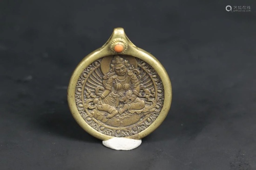 A TIBETAN BRONZE AMULET