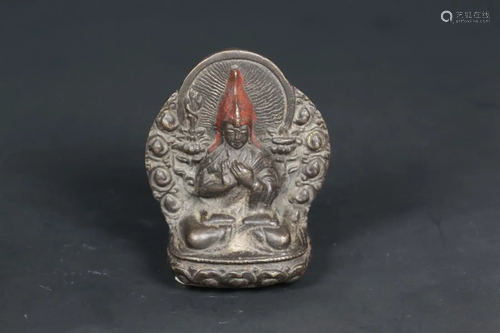 A TIBETAN BRONZE AMULET