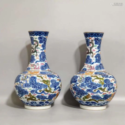 PAIR OF BLUE AND WHITE FAMILLE ROSE CELESTIAL VASE