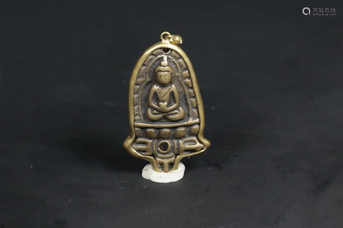 A TIBETAN BRONZE AMULET